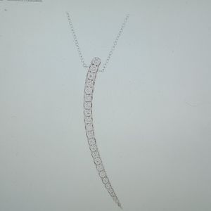 14k white gold and diamond pendant